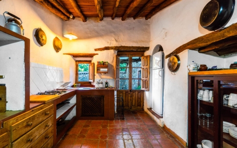 The kitchen is simple and rustic